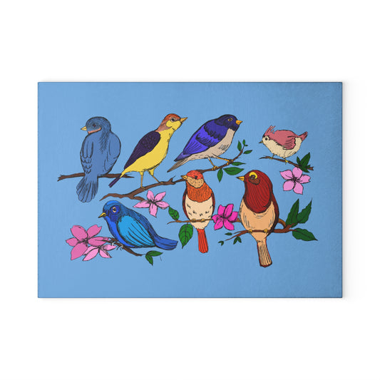 Glass cutting board with colorful birds